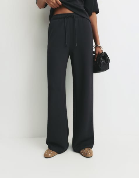 Pull&Bear - Pantaloni felpati neri con fondo ampio - view 1