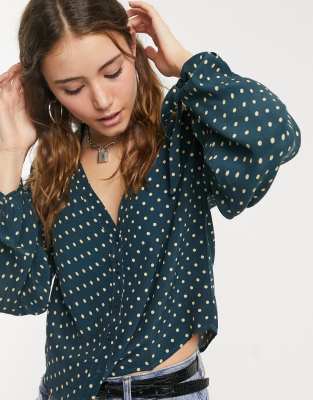 green polka dot top