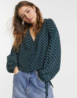 green and black polka dot blouse