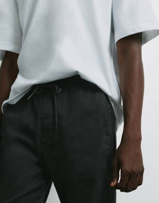 Pull&Bear Regular fit jogging trousers in black, 3 of 7