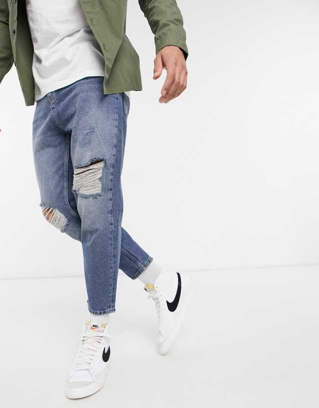 Pull&Bear relaxed fit jean in mid blue with rips