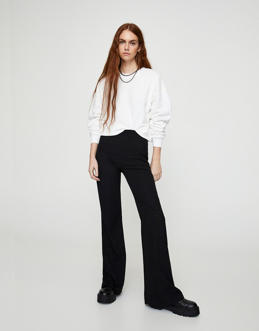 Pull & Bear ribbed flare pants in black