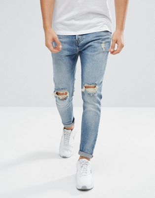 tapered carrot fit In Mid Wash Blue | ASOS