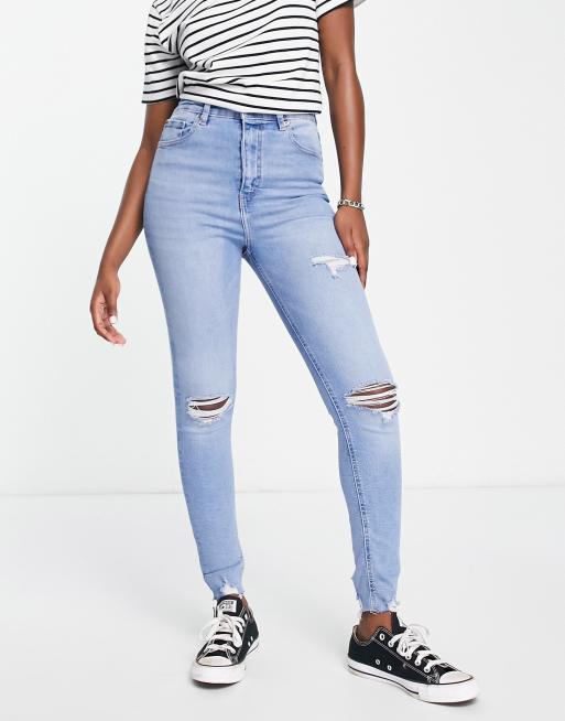 Light blue ripped skinny sales jeans