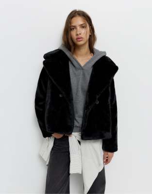 Pull & Bear Short Faux Fur Coat In Black