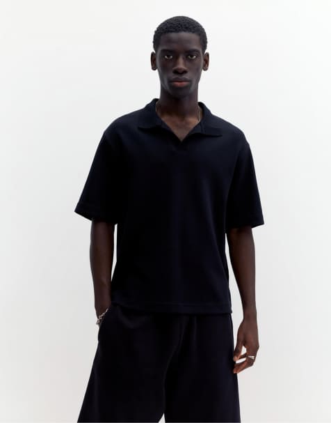 Pull&Bear Short sleeve interlock polo shirt in black - view 1