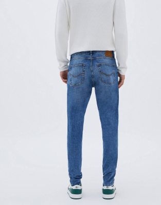 mid blue sid skinny jeans