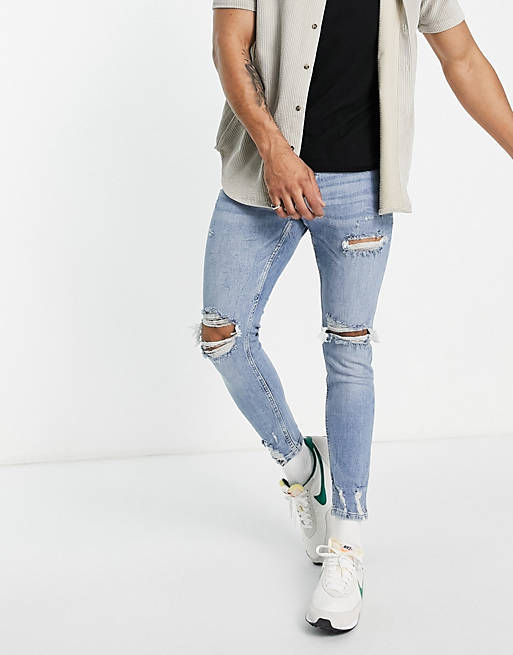 Pull&Bear skinny jeans with rips in mid blue | ASOS
