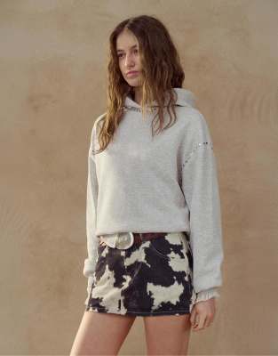 Pull & Bear - Skort mit schwarz-weißem Kuhfellmuster-Bunt