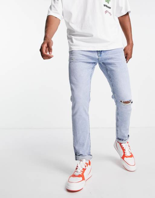 Pull&Bear slim fit jeans with rips in light blue | ASOS