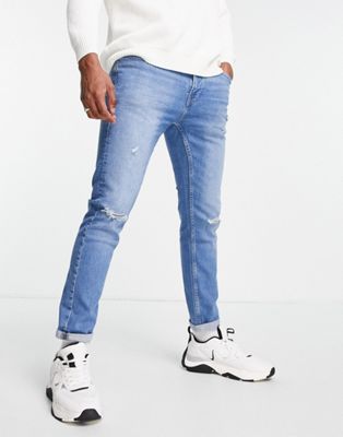 Pull&Bear slim fit jeans with rips in mid blue