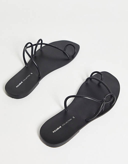 gone crazy Surichinmoi Unpacking Pull&Bear strappy flat sandals in black | ASOS