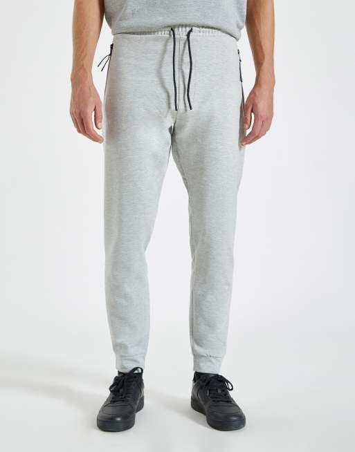 Pull Bear sweatpants with zip pockets in gray ASOS