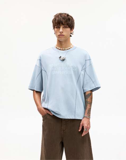 Pull&Bear - T-shirt azzurra con cuciture a vista e scritta - view 1