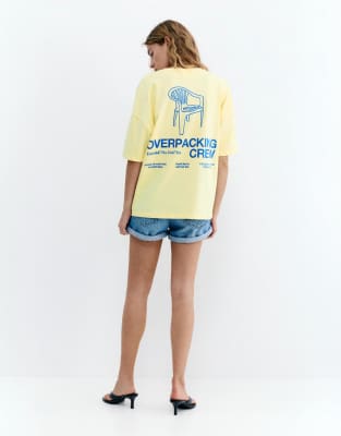 T-Shirt in Hellgelb mit Stuhl-Print Gelb M