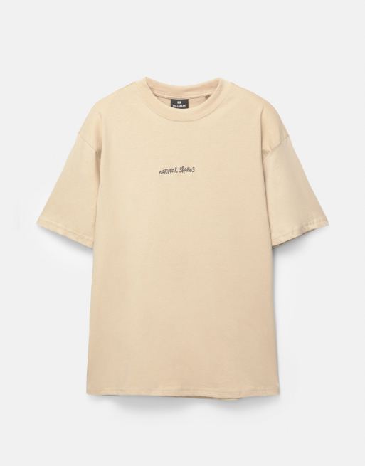 Pull&Bear – T-Shirt in Ocker mit Frauen-Silhouette