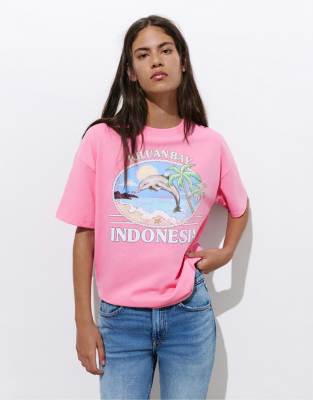 T-Shirt in Rosa mit „Indonesien"-Delfin-Print Rosa XS