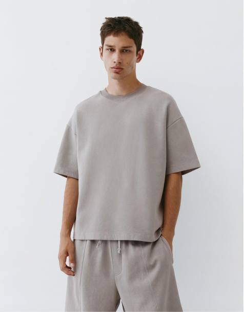 Pull&Bear - T-shirt van zware stof met interlocknaden en korte mouwen in gemêleerd grijs - view 1