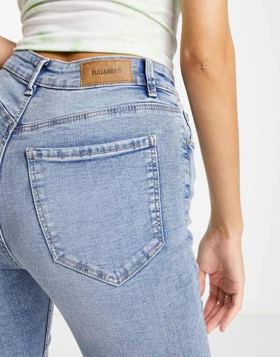 https://images.asos-media.com/products/pullbear-tall-high-rise-skinny-contour-jeans-in-mid-blue/202701445-4?$n_550w$&wid=550&fit=constrain