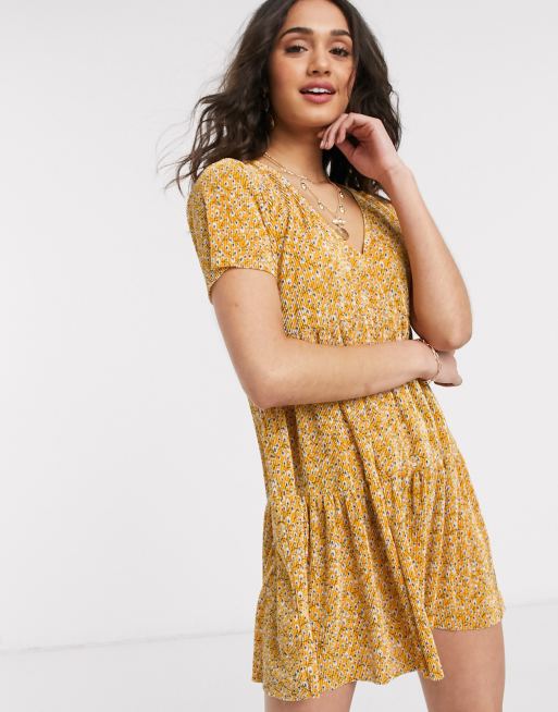 Pull Bear tiered smock mini dress in yellow floral print