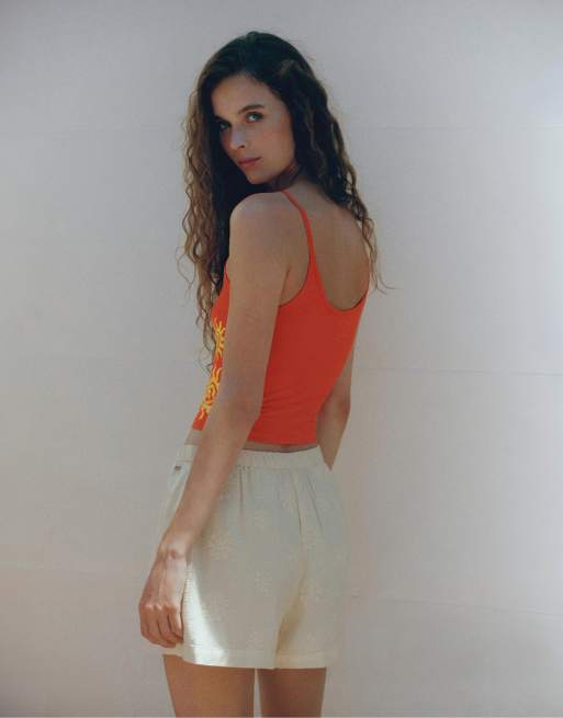 Pull&Bear top court graphique soleil rouge, 2 de 6