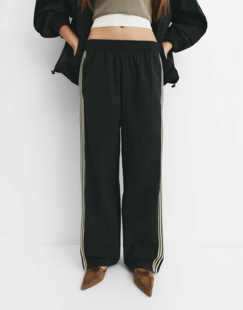 Pull&Bear Tracksuit pants with side stripe in black - view 1