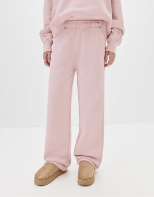 Pull & Bear - Trainingshose in Rosa mit weitem Bein