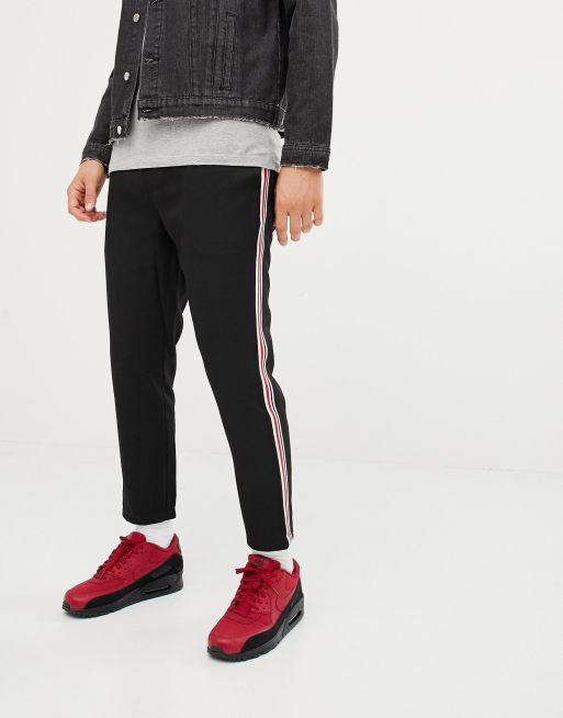 Black track pants with hot sale red and white stripe