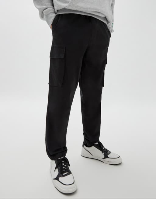 Pull&Bear utility cargo trousers in black | ASOS