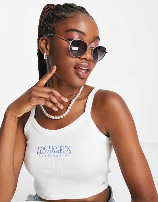 https://images.asos-media.com/products/pullbear-varsity-cropped-top-in-white/203100864-1-white?$n_550w$&wid=550&fit=constrain