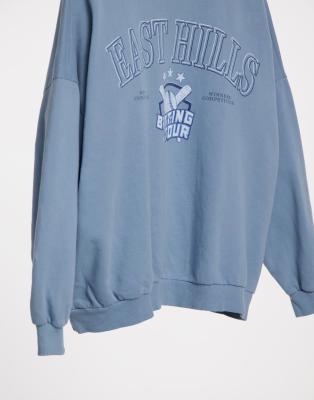 washed blue sweatshirt