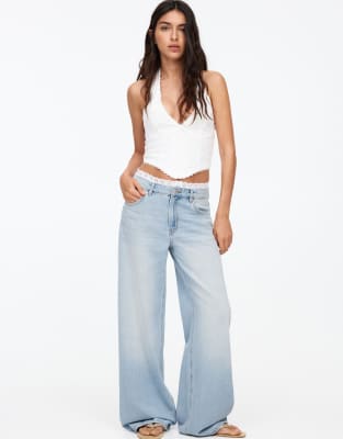 Pull & Bear - Weite Jeans in Blau mit Spitzenborte