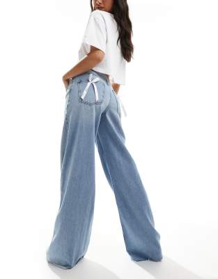 Pull & Bear Wide Fit Bow Detail Jeans In Mid Blue