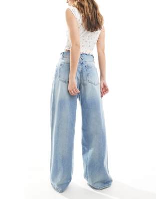 Pull & Bear Wide Leg Jeans With Raw Waistband In Blue