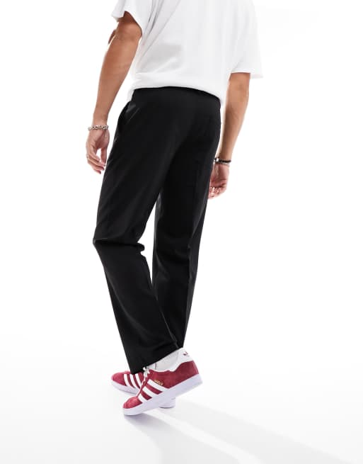 ASOS DESIGN baggy corduroy pants in black