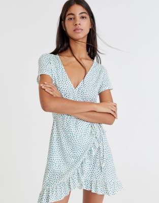 green and white polka dot wrap dress