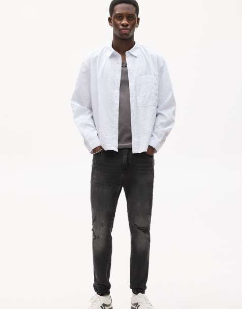 Pull&Bear – Zerrissene Karottenjeans in verblasstem Schwarz - view 1