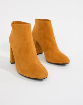 mustard heeled boots