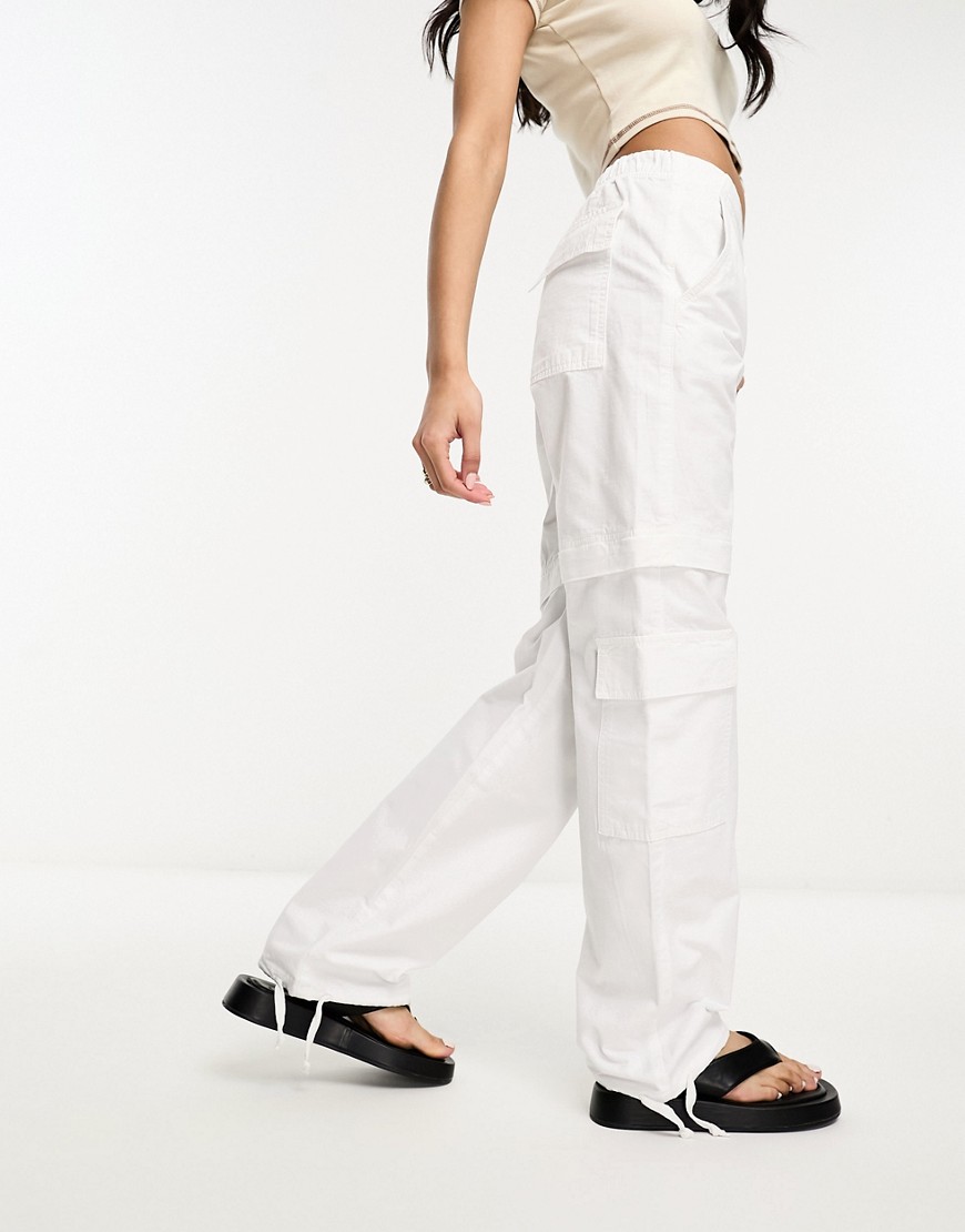 Pull & Bear zip off cargo trousers in off white