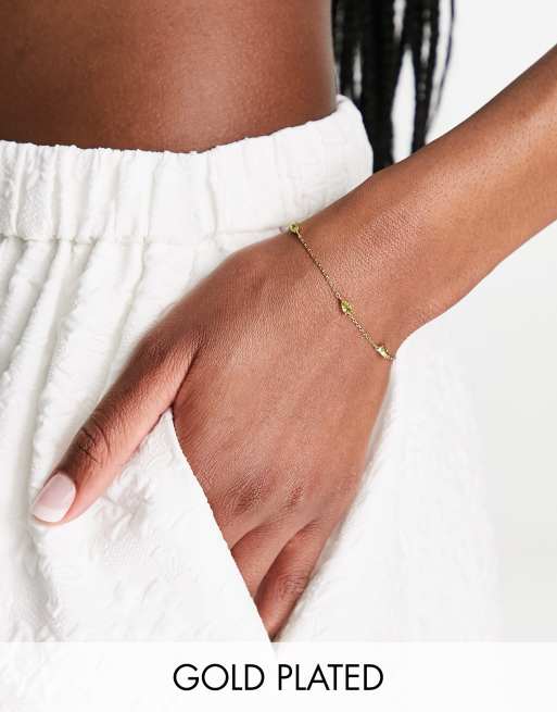 Pulsera con charms de piedras semipreciosas verdes chapada en oro de Astrid & Miyu 