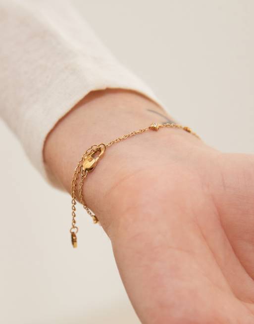 Pulsera de acero inoxidable chapada en oro de 18 quilates Written In The Stars de Abbott Lyon, 3 de 3