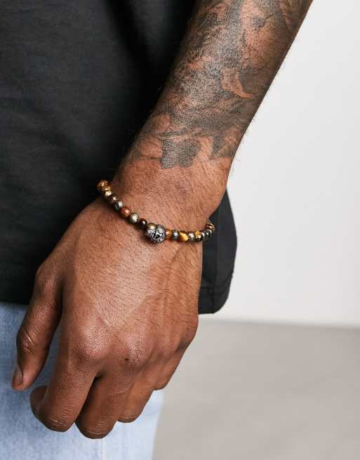 Pulsera de cuentas marrones y charm de acero inoxidable de ASOS DESIGN   