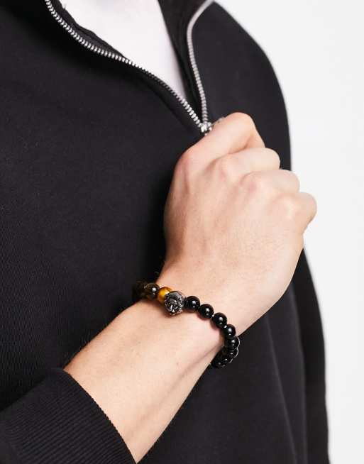de cuentas negras y ojos tigre con de acero inoxidable en forma de león de ASOS DESIGN | ASOS
