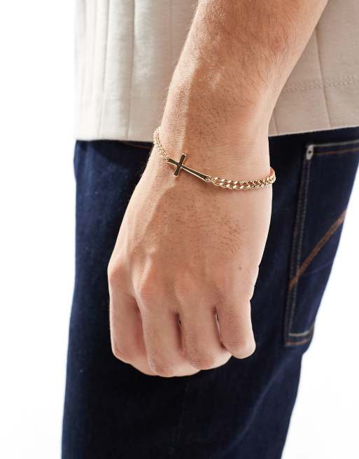 Pulsera dorada con cadena y cruz de Icon Brand