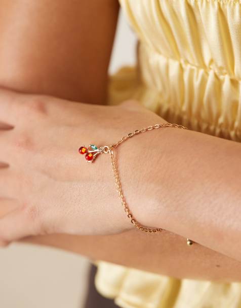 Pulsera dorada con charm de cereza de DesignB London - view 1