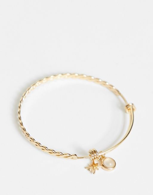 Pulsera dorada con charm de ópalo y estrella de ASOS DESIGN