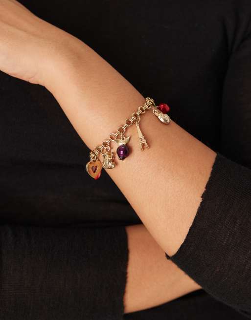 Pulsera dorada con charms de colores de ASOS DESIGN