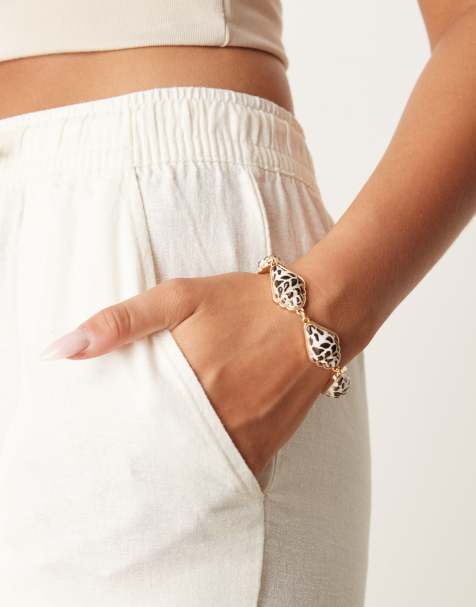 Pulsera dorada con charms de conchas de imitación pintadas de ASOS DESIGN - view 1