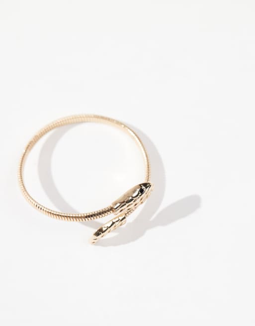 Pulsera dorada con diseño cruzado y detalle de serpiente de ASOS DESIGN, 4 de 4