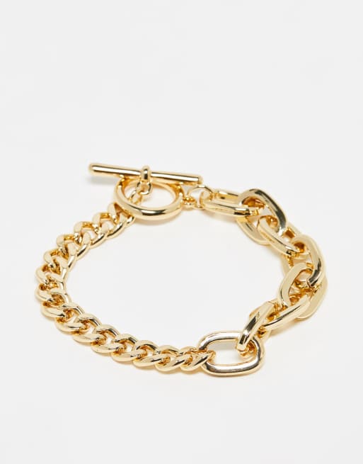 Pulsera dorada con diseño de cadenas combinadas de French Connection